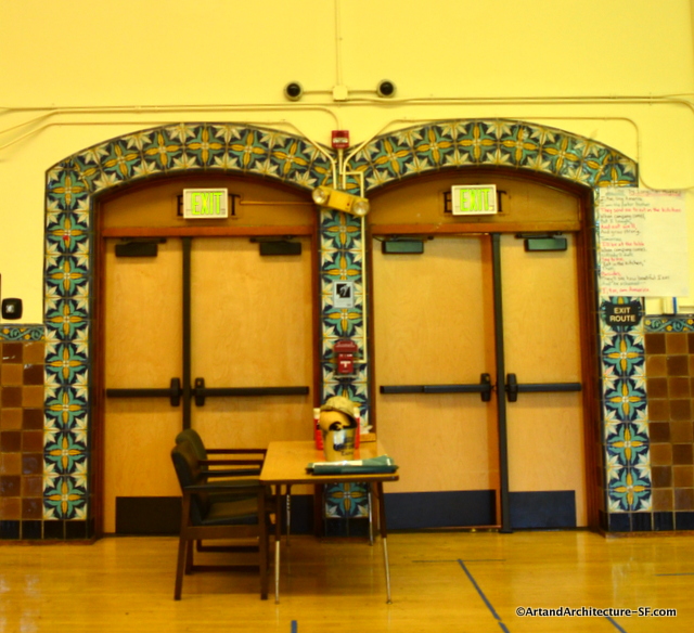 Tiles adorn the interior doors of the auditorium